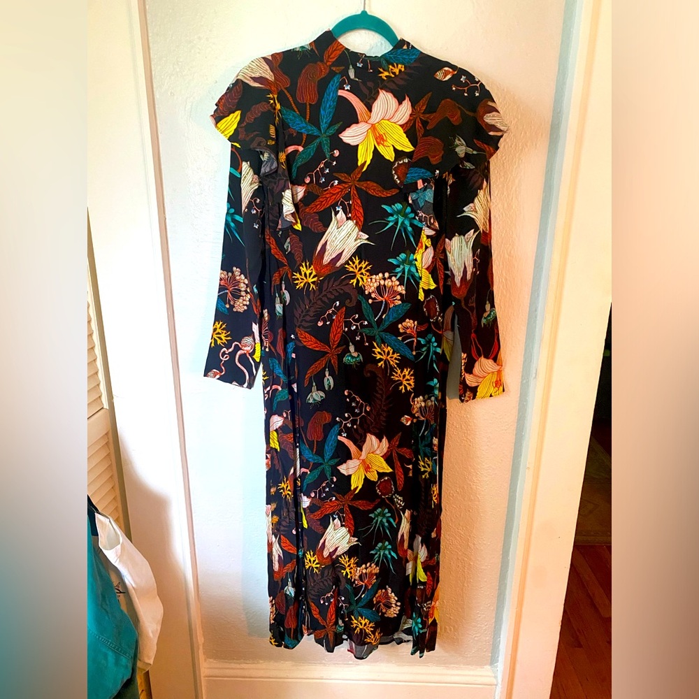 Long sleeve floral dress with ruffles and back detail